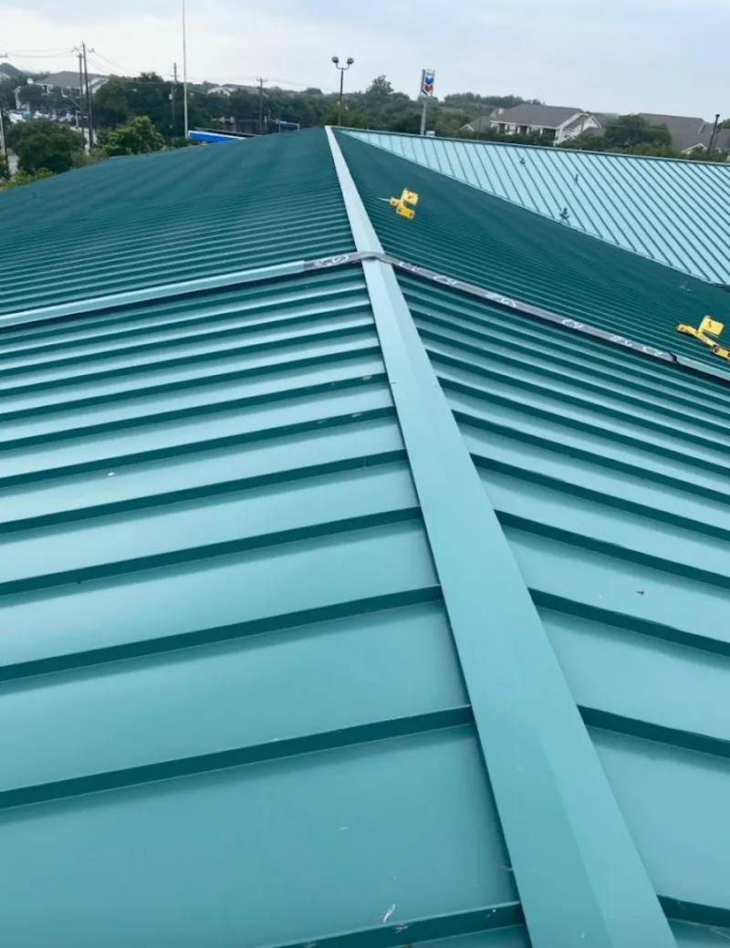 Green commercial metal roof ridge and valley for Metal Roof Repair in Kirby